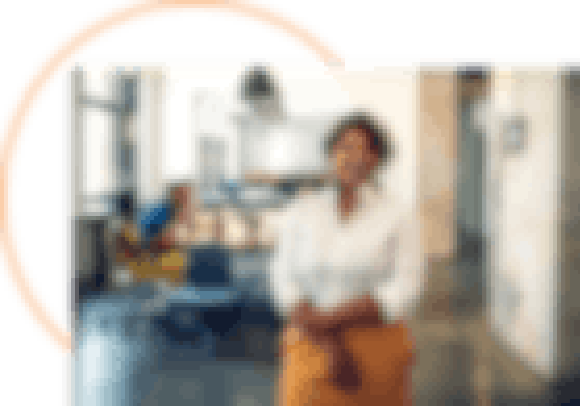 A lady standing in front of a meeting table